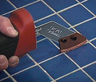 Grout Grabber in action. grout grabber, remove grout, mildewed grout, remove mildewed grout, remove damaged tiles, grout removal system, grout removing tools, grout removal tools, clean grout joints, regrout, regrouting, tile repair, repair tiles, repair damaged grout, change grout color, repair cracked tiles